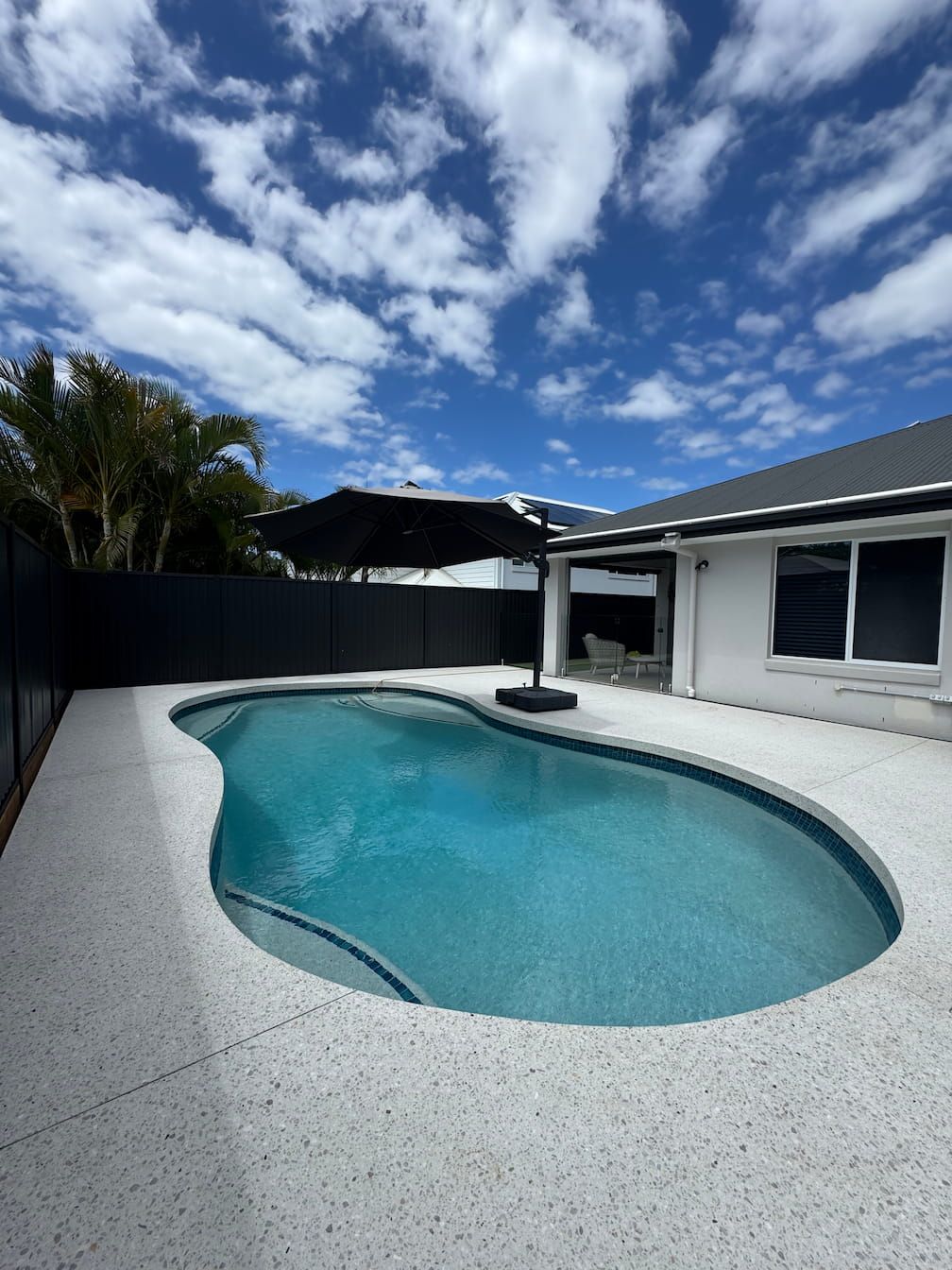 A concrete pool area