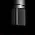 Black studio microphone against a dark background, highlighted with subtle lighting.