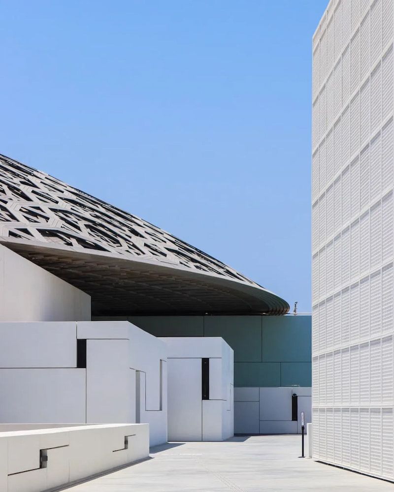 Modern White Buildings With Geometric Shapes Under a Patterned Dome — Unique Waterproofing Solutions in North Rocks, NSW