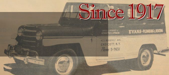 A black and white photo of a Evans plumbing & heating work jeep from 1917 
