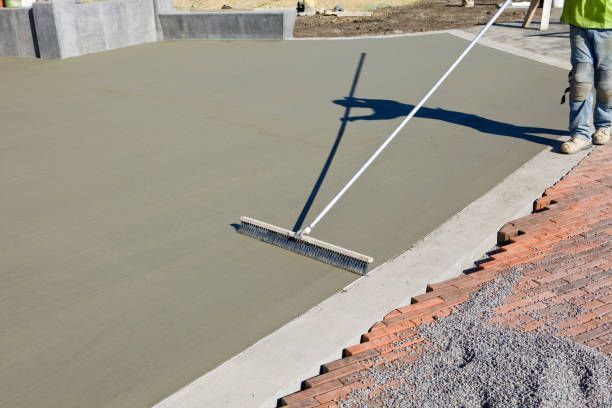 worker crouching on the cement