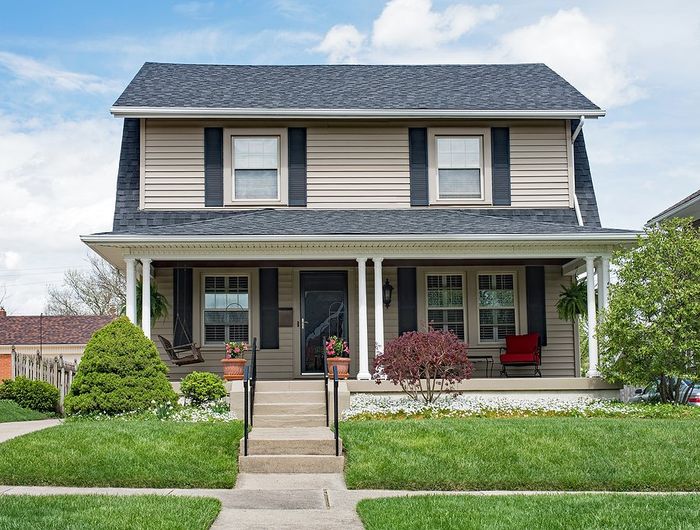 big house with outdoor lawn