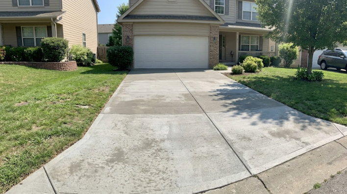 A freshly poured concrete driveway leading to a home in Summerville SC.