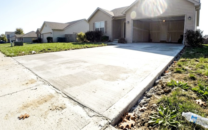 Freshly poured smooth concrete driveway leading to a home in Summerville SC.