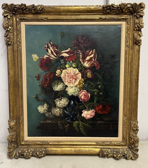 Framed oil painting of a dark floral bouquet with cream, pink, and red flowers