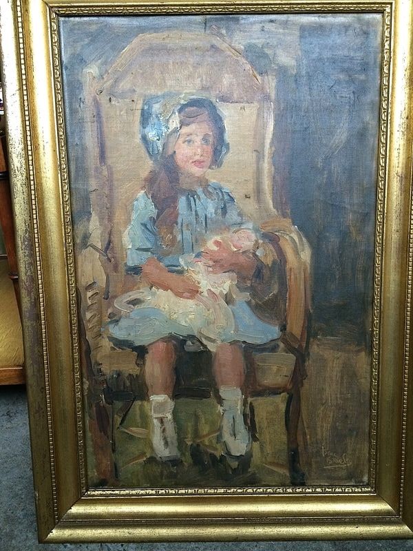 Framed painting of a seated child in a blue dress and white socks, holding a doll on a chair