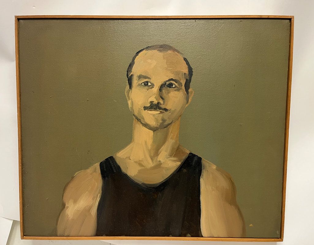 Portrait of a man in a black tank top against a muted green background, framed in gold