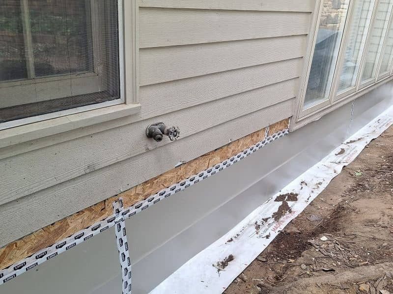 Foundation pier installation on an Oklahoma residential home