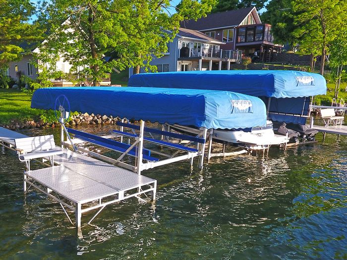 Shoremaster Boat lifts with Blue Canopy