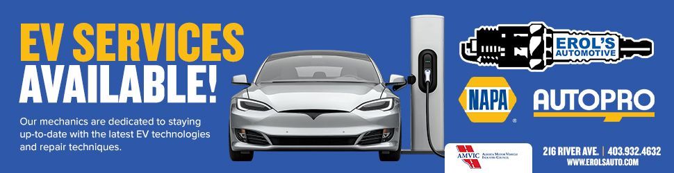 A tesla model s is charging at a napa autopro charging station. | Erol's Automotive