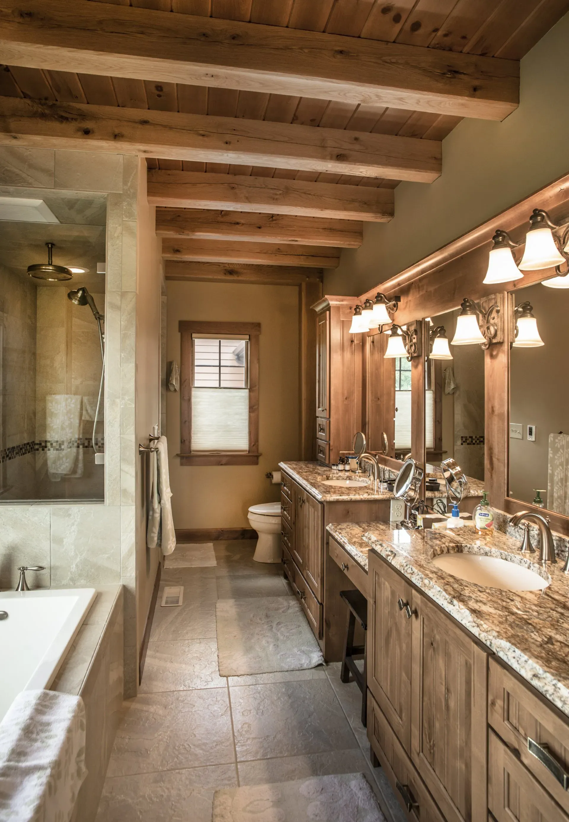 A bathroom with a lot of sinks and mirrors.