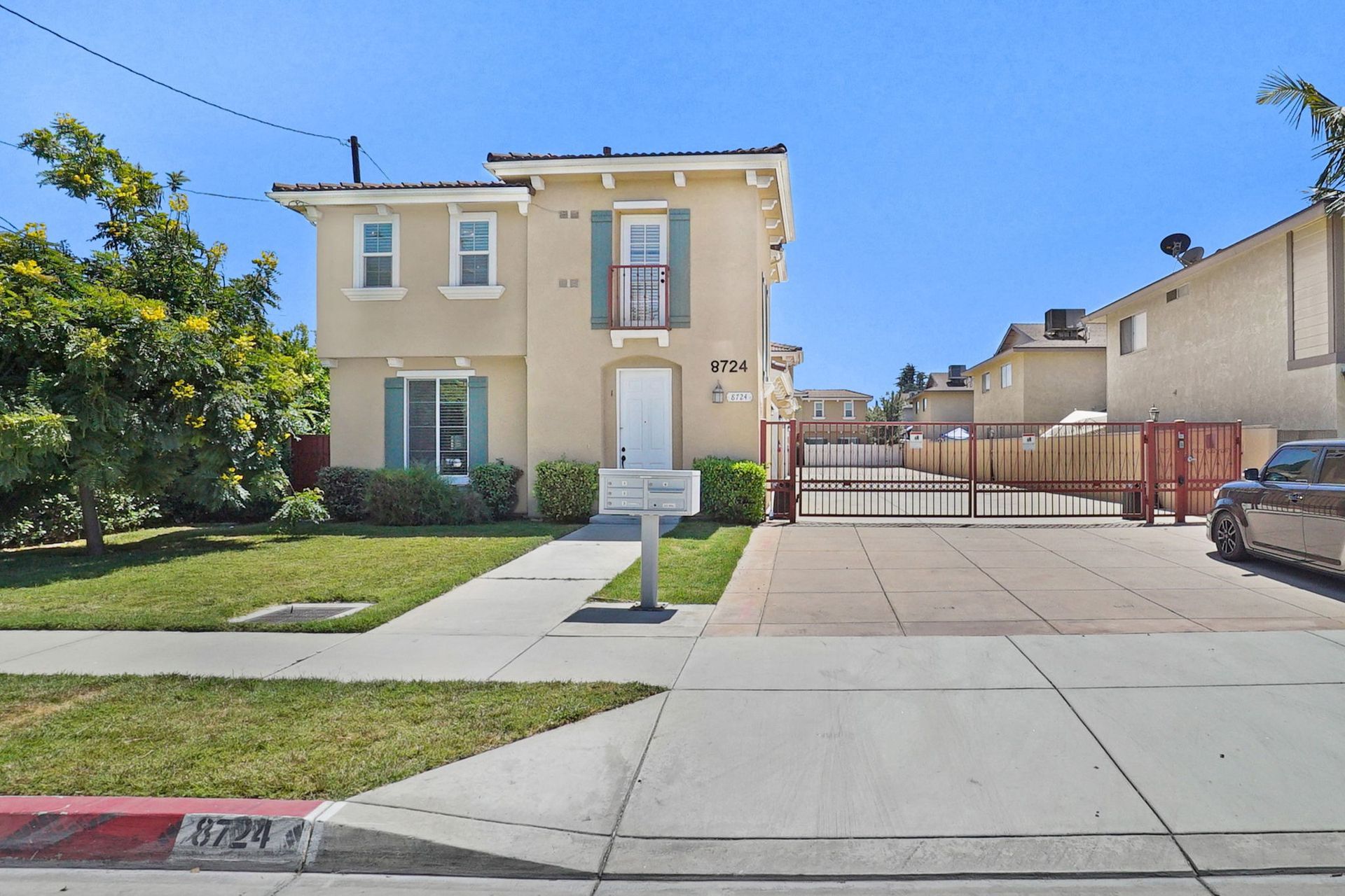 A house with a mailbox in front of it
