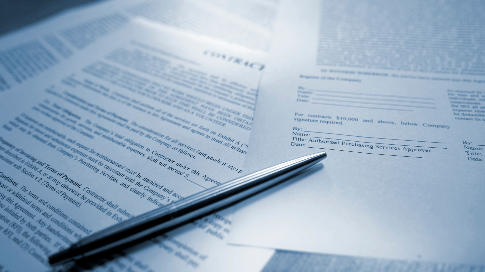 Stack of papers consisting of contracts