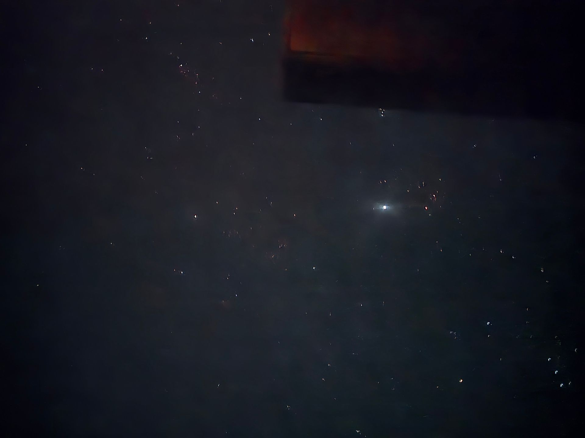 Cabin eave with a view of the night sky and stars