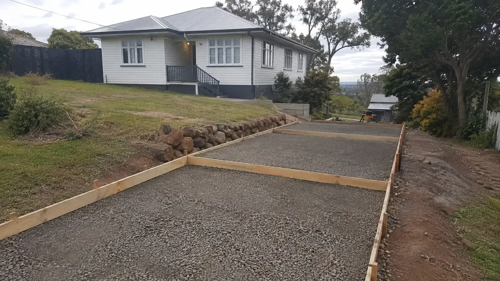 Preparing a long driveway on this semi-rural property near Upper Flagstone, Lockyer Valley.