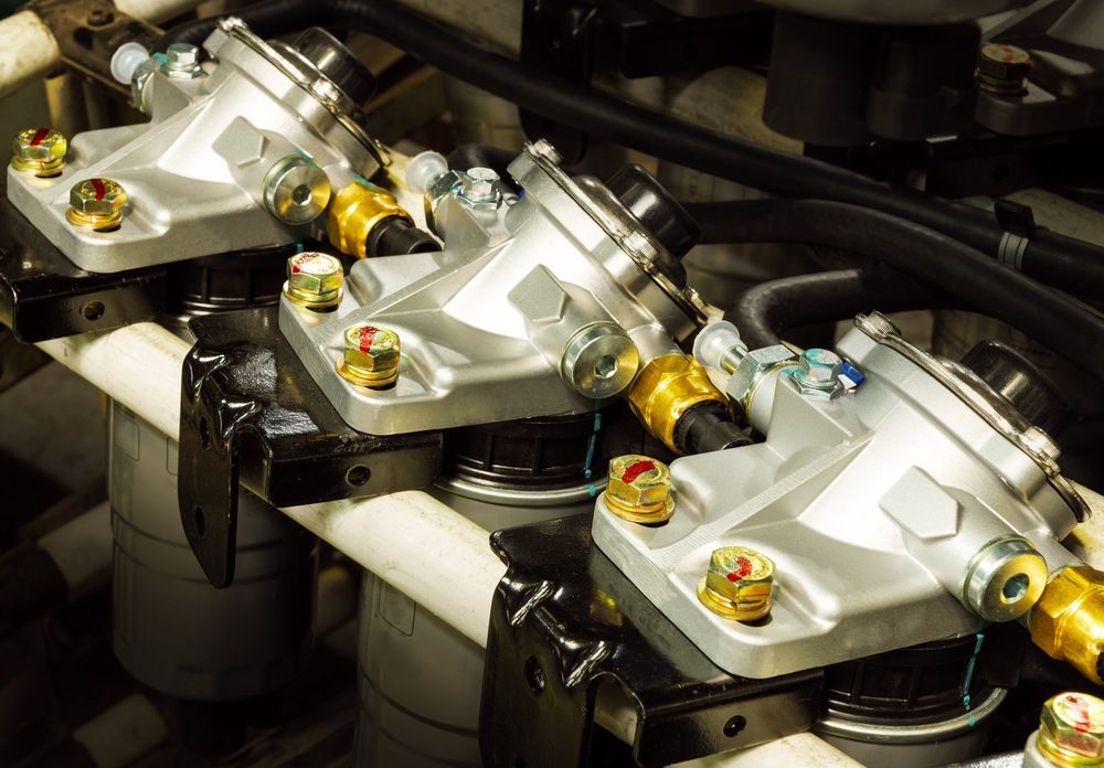 A Close Up Of A Row Of Valves On A Machine — JA Toft & Co In Bundaberg Central, QLD
