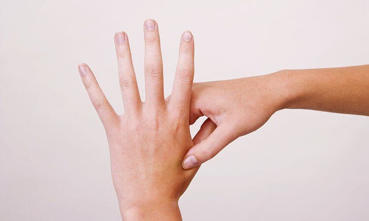 acupressure on the hand