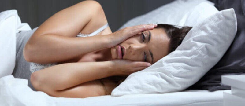 woman unable to sleep