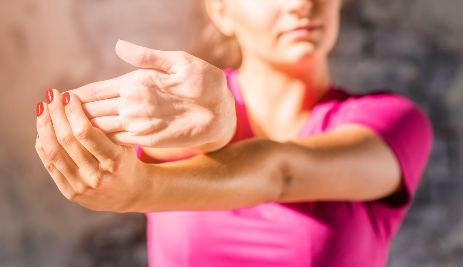 woman stretching her fingers