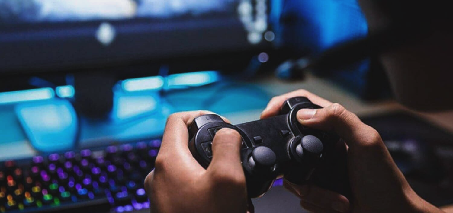 fingers on a gaming console