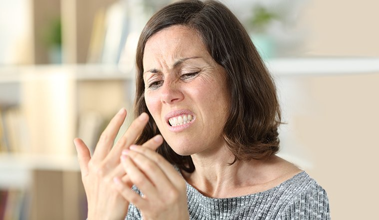 woman with finger pain