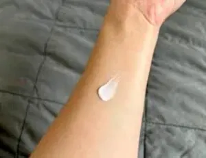 skin lotion on forearm