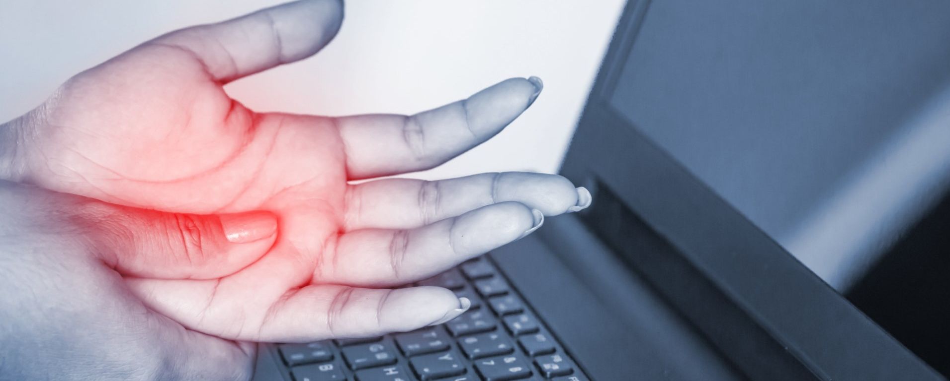 burning hand at computer