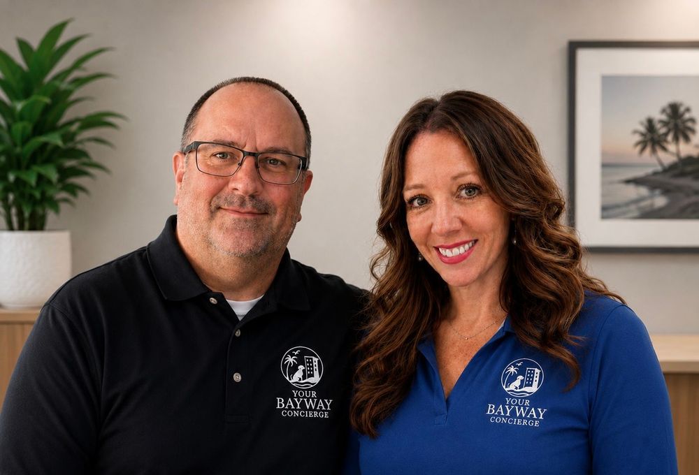 Portrait of a smiling woman in a blue Bayway polo shirt against a blurred indoor background