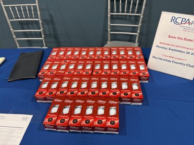 RCPA 2026 PAC table with golf balls