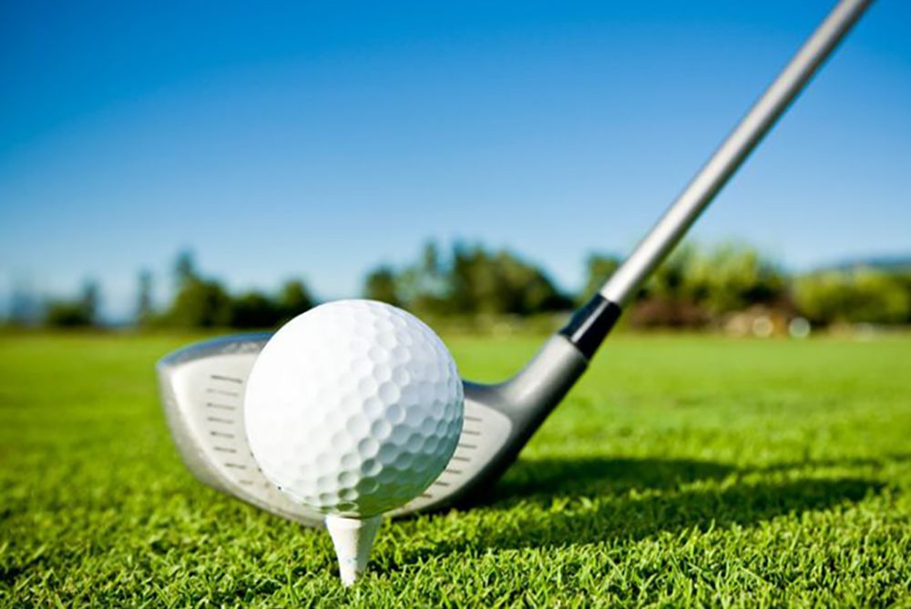 Golfers in golf carts on the course