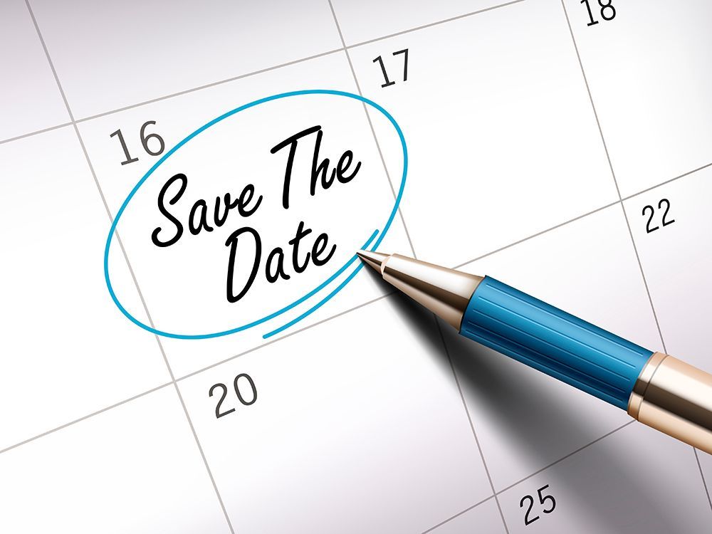 Pen circling “Save the Date” on a calendar page