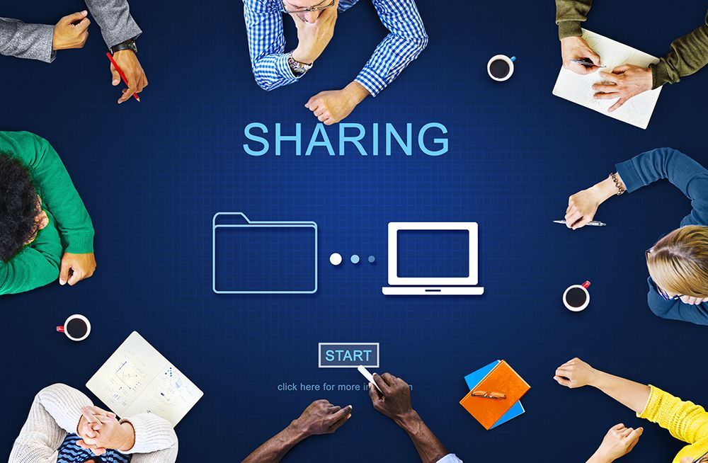People around a blue table with