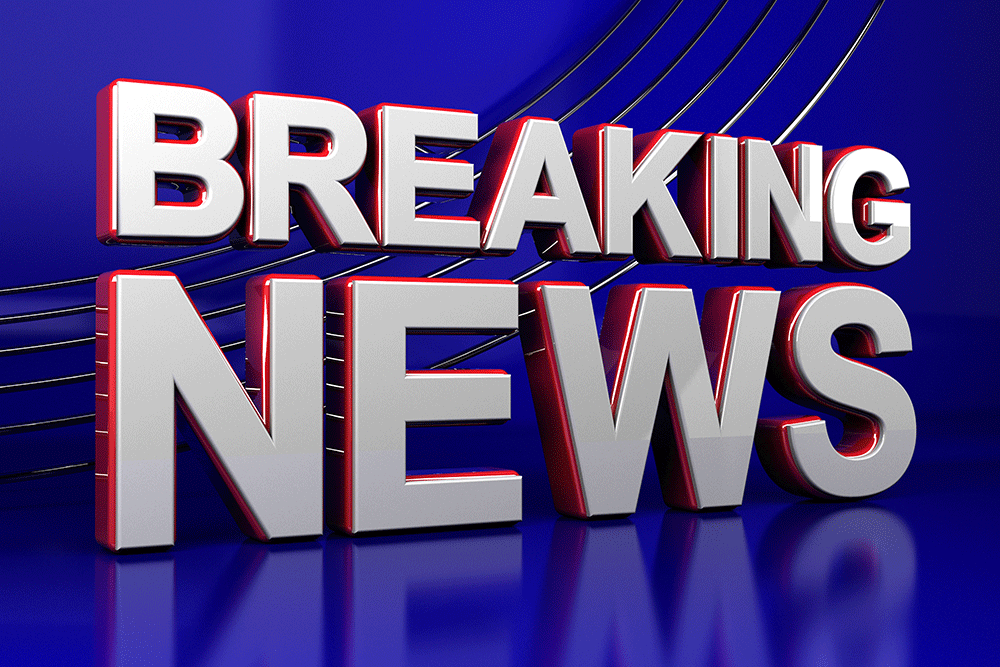 BREAKING NEWS in white font on blue background