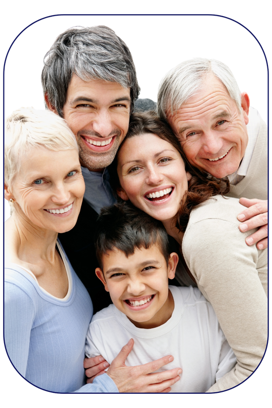 A multi-generational family smiles broadly revealing bright healthy teeth