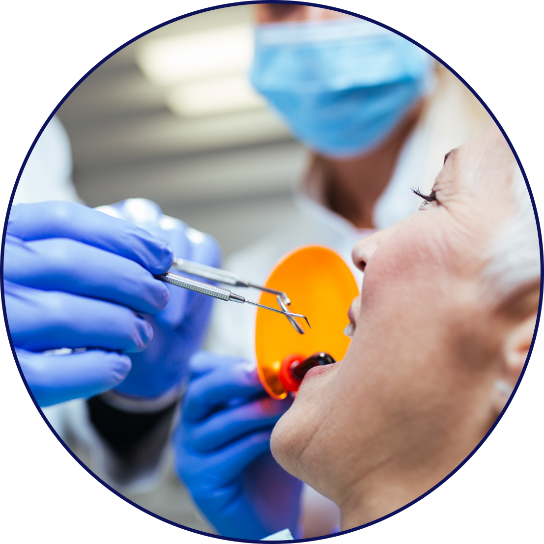 Woman having an oral exam in a dental clinic