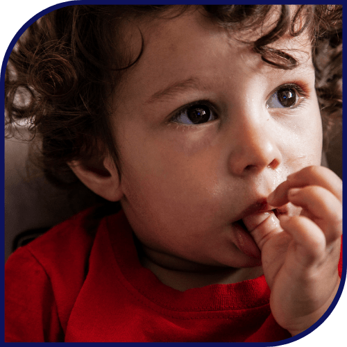 a kid sucking his thumb