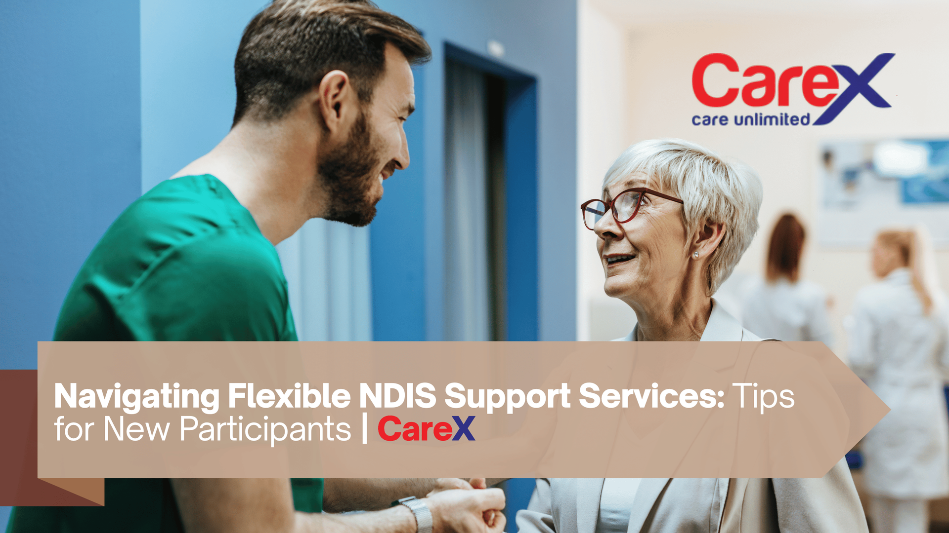 CareX support worker in scrubs talking warmly with an older woman in a clinic setting