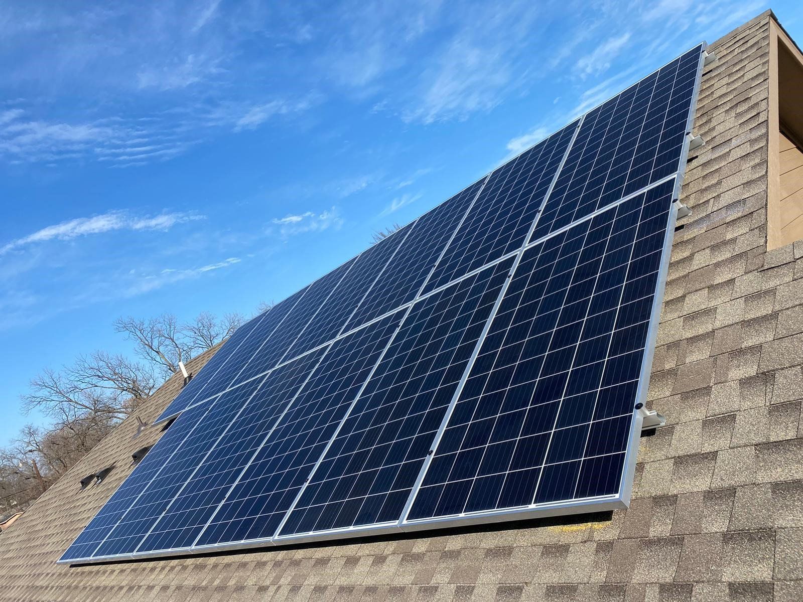 A roof with a lot of solar panels on it