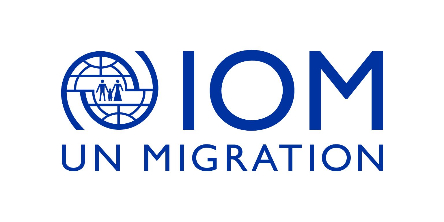 The logo for iom un migration is blue and white.