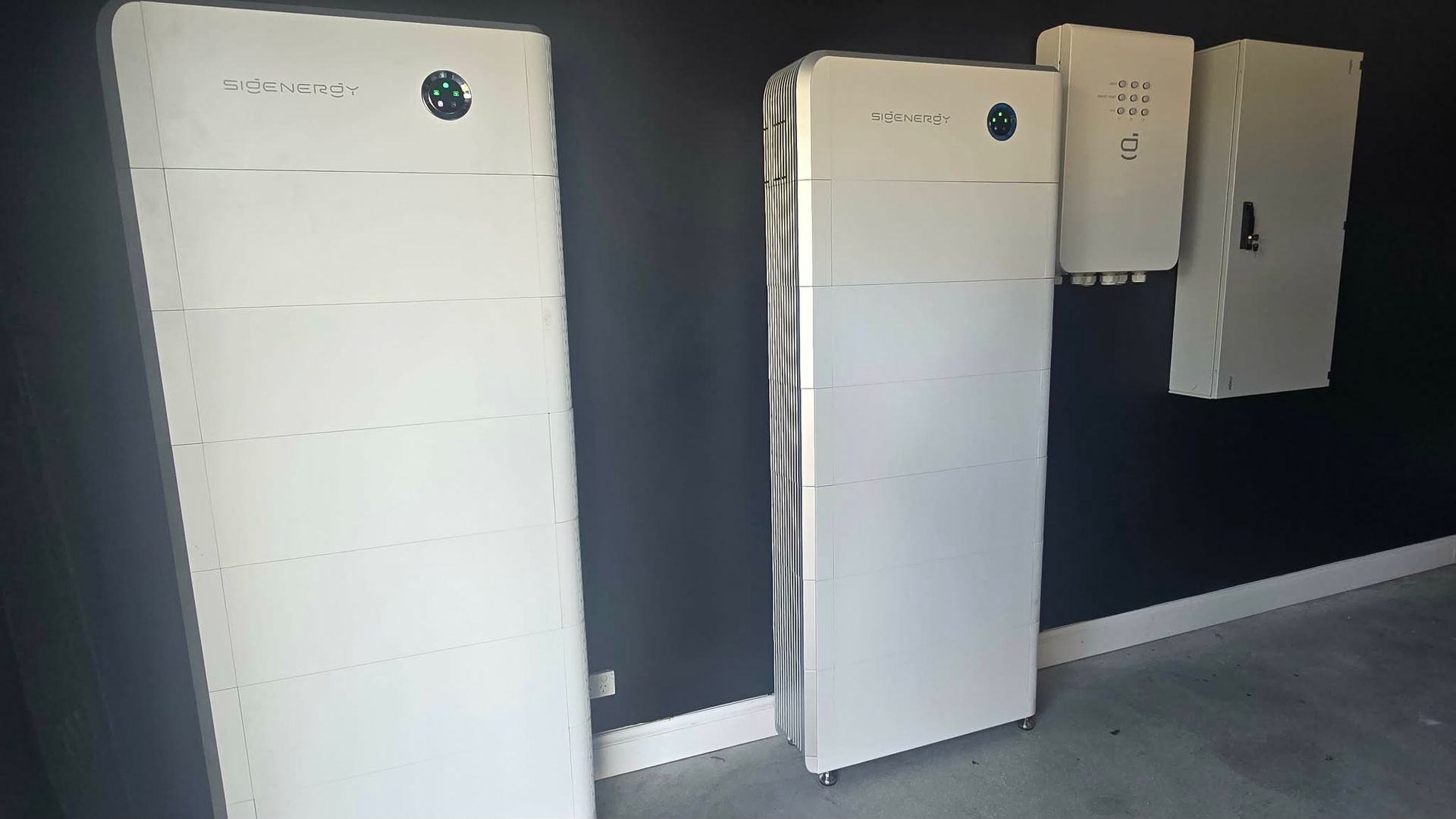 Sleek wall-mounted home solar battery unit installed in a tidy Australian garage next, Warrnambool V