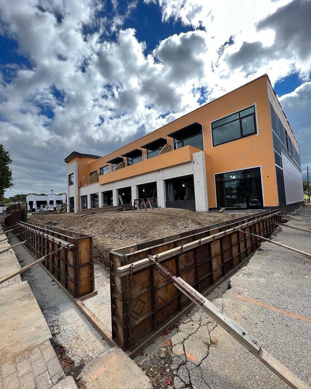 A Large Orange Building with a Lot of Windows is under Construction | Wooster, OH | Bogner Construction Company