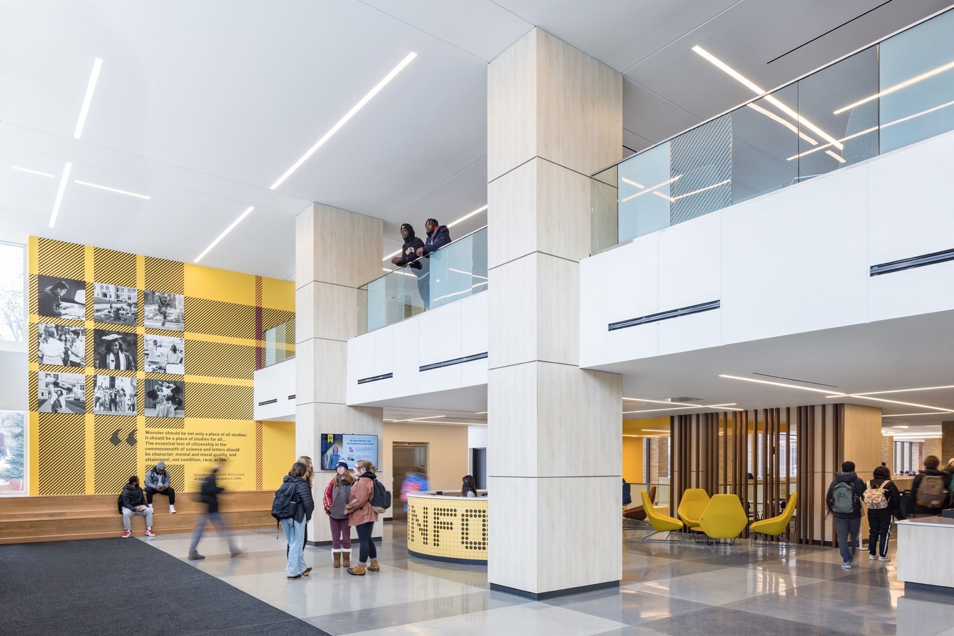 A Group of People are Standing in a Lobby of a Building | Wooster, OH | Bogner Construction Company