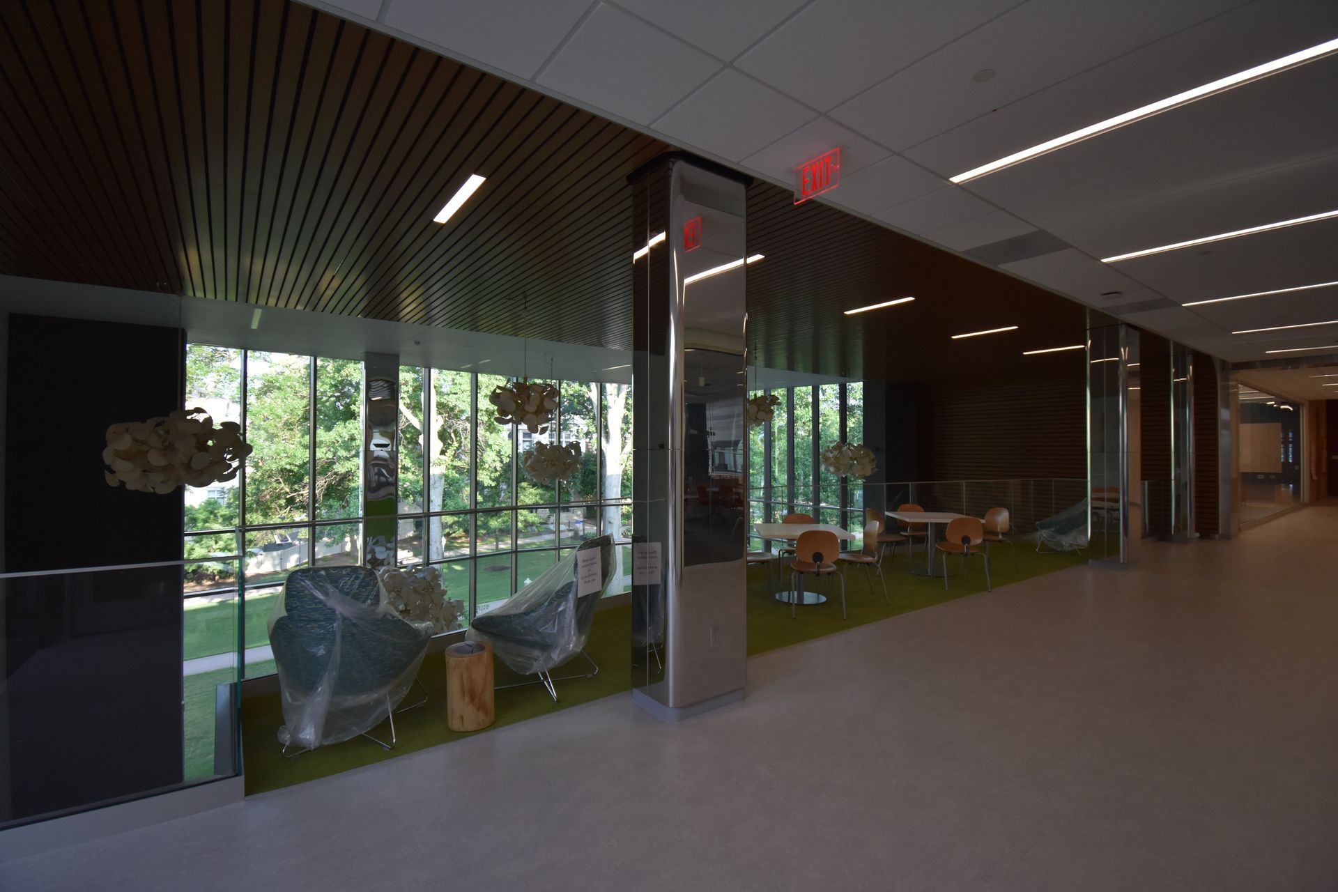 A Hallway in a Building with a Lot of Windows and Chairs | Wooster, OH | Bogner Construction Company