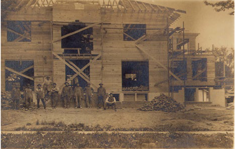 A Group of Men are Standing in Front of a Building under Construction | Wooster, OH | Bogner Construction Company