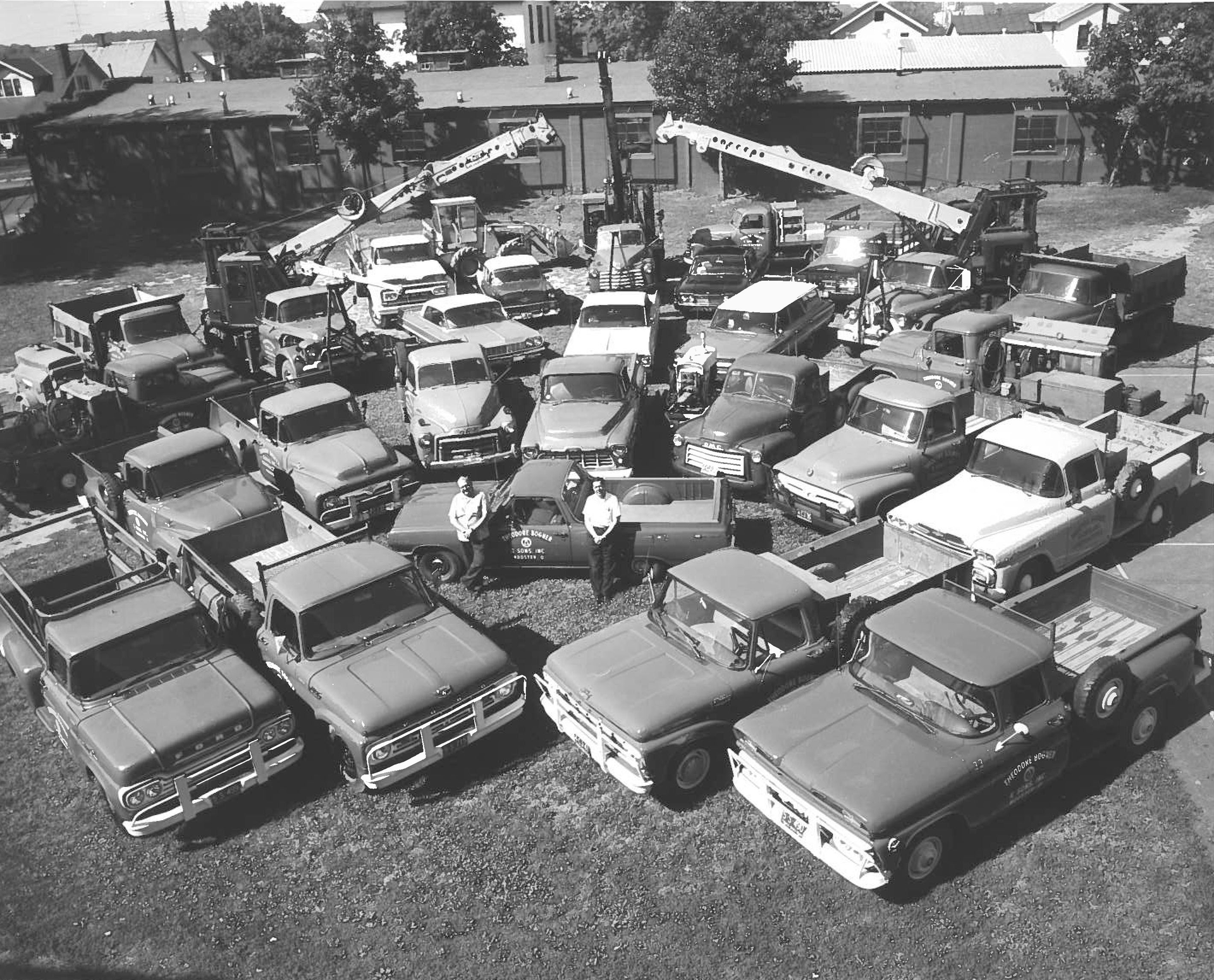 A Black and White Photo of a Lot of Trucks | Wooster, OH | Bogner Construction Company