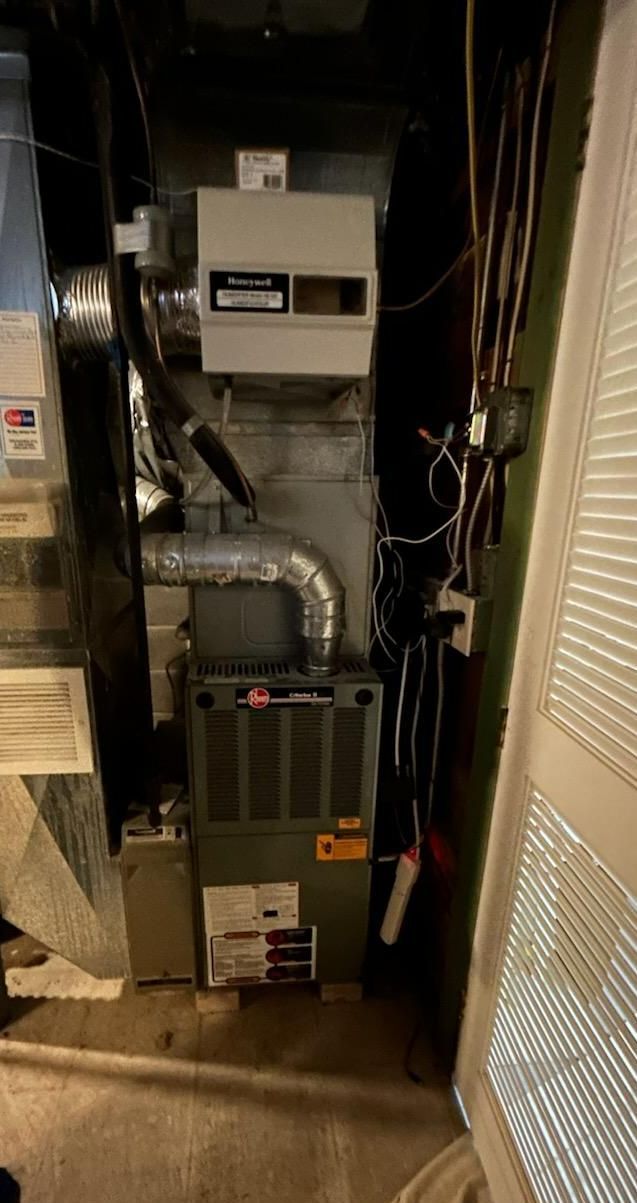 Air conditioner Maintenance in a basement.