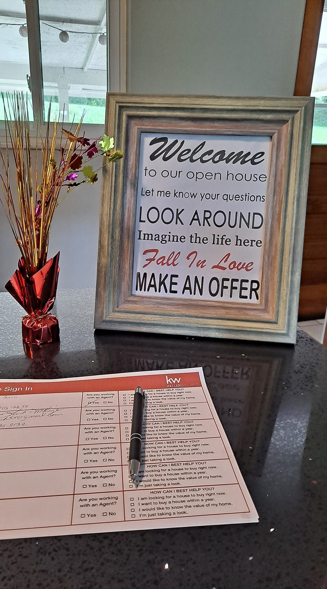 A framed sign reading 