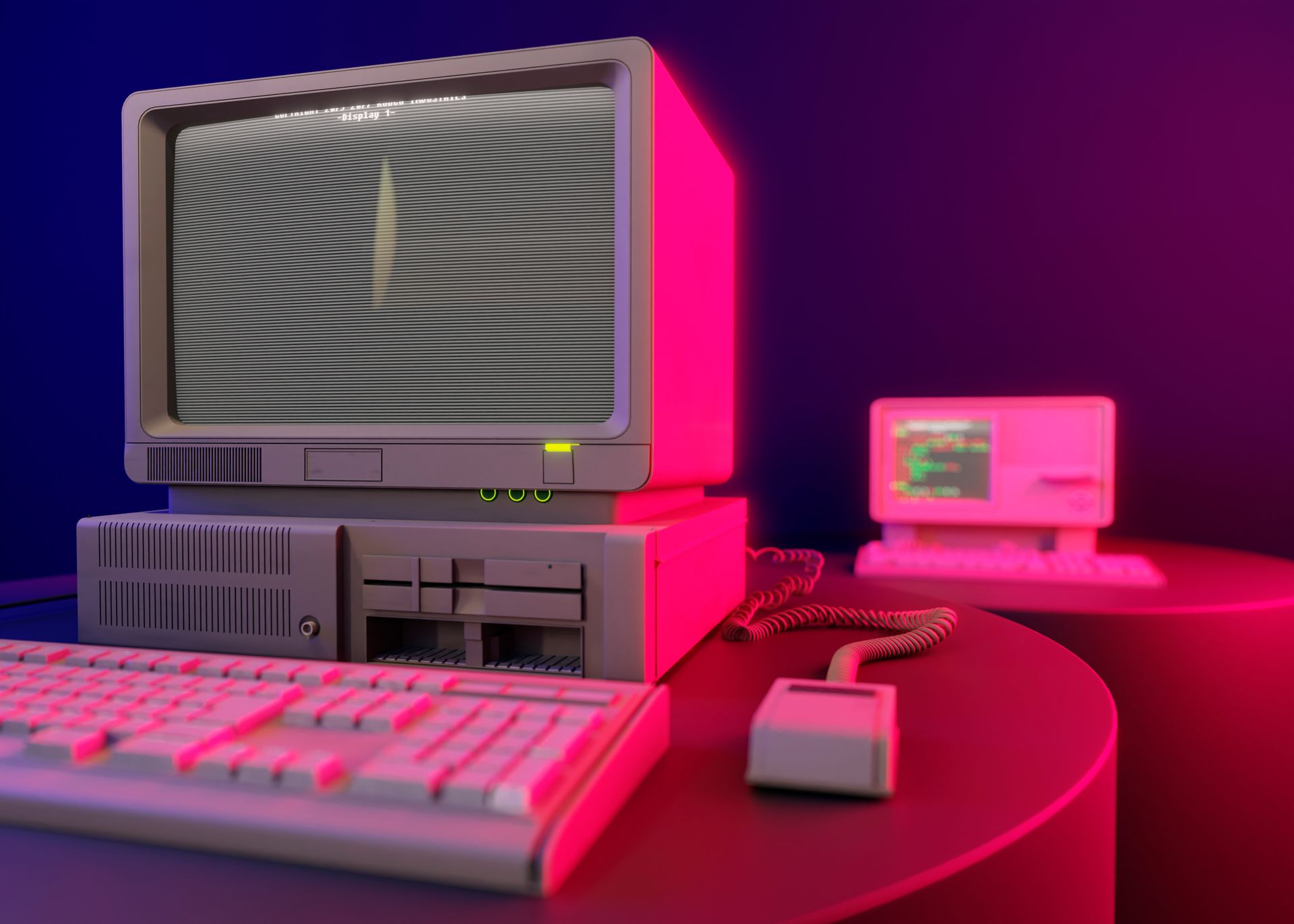 Retro desktop computer setup with pink-lit CRT monitor, keyboard, mouse, and small monitor on a desk