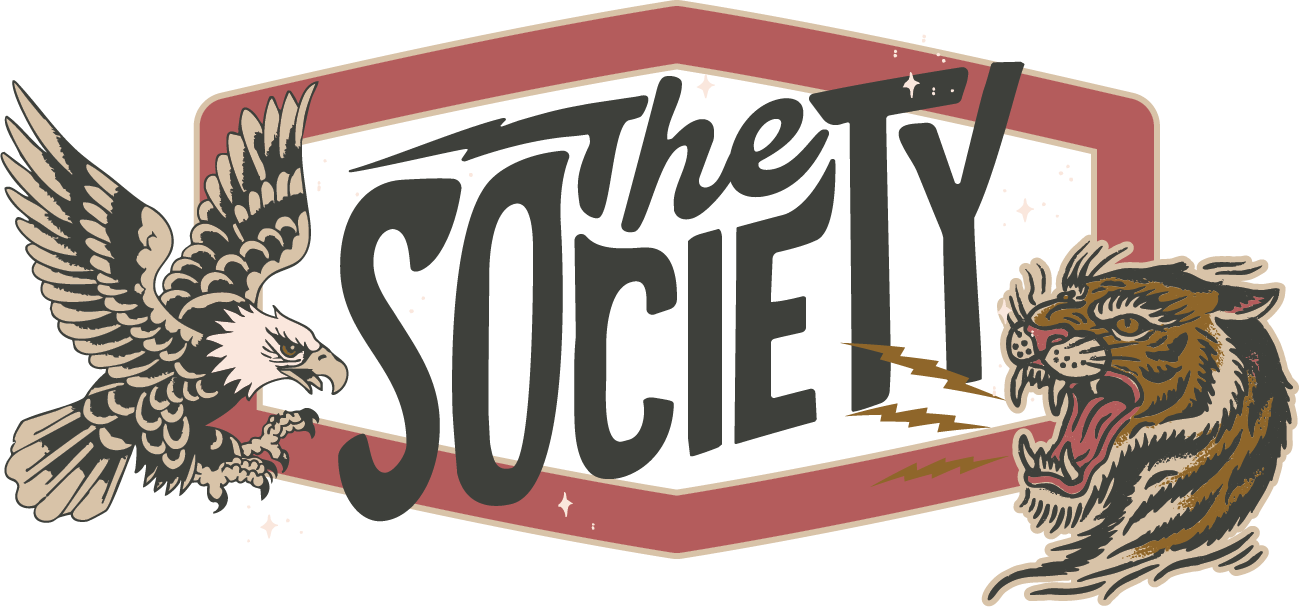 Logo with the words “The Society” in black and red, flanked by an eagle and a lion illustration.