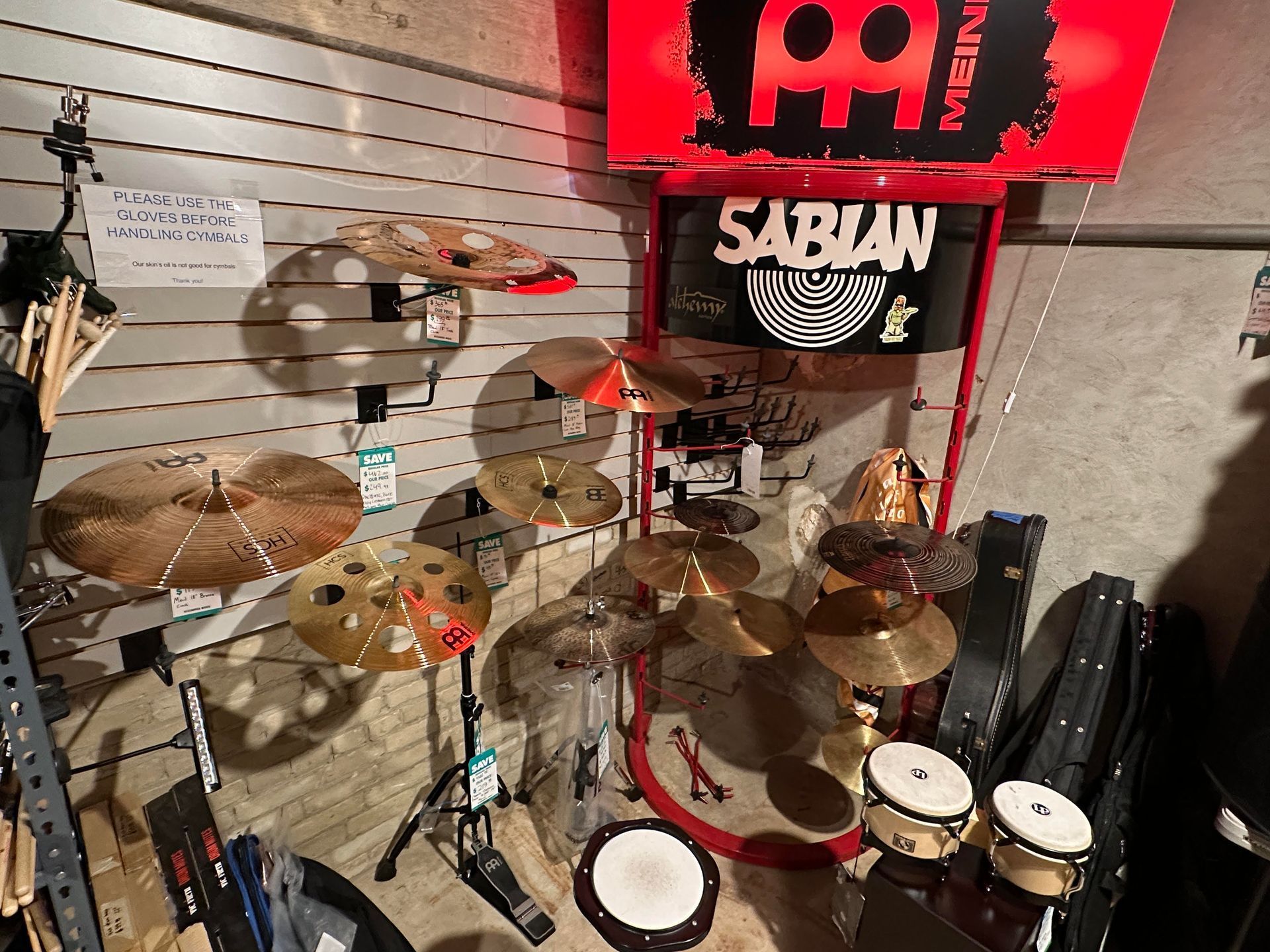 Drum set with cymbals, toms, and a kick drum displayed in a music store.